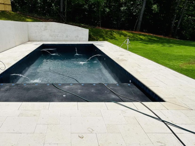 Elegant French Grey Gunite Pool with Shell Stone Travertine